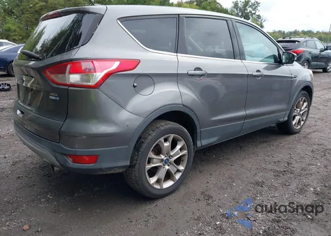 2013 Ford Escape Sel z USA, uszkodzony, nr VIN 1FMCU9H96DUC87413